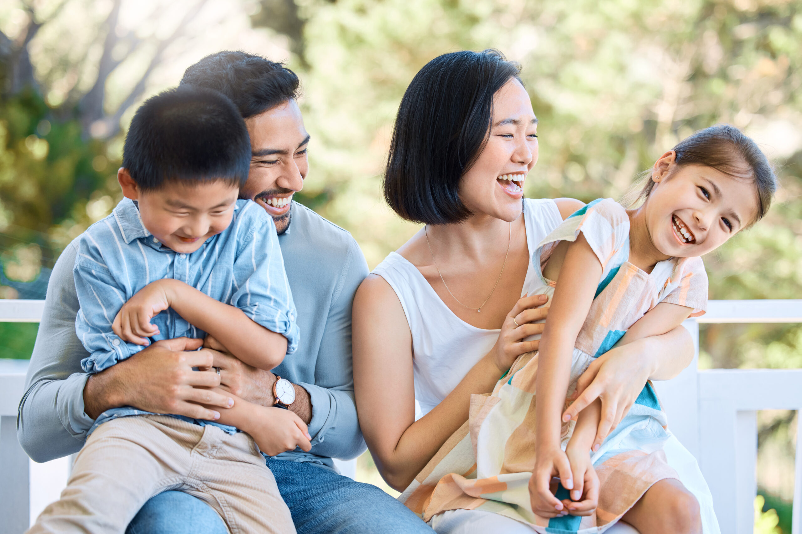 Shot of a happy young family having a fun day in the park.